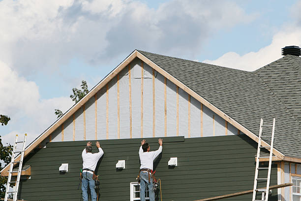 Professional Siding Contractor technician working in Elysburg, PA